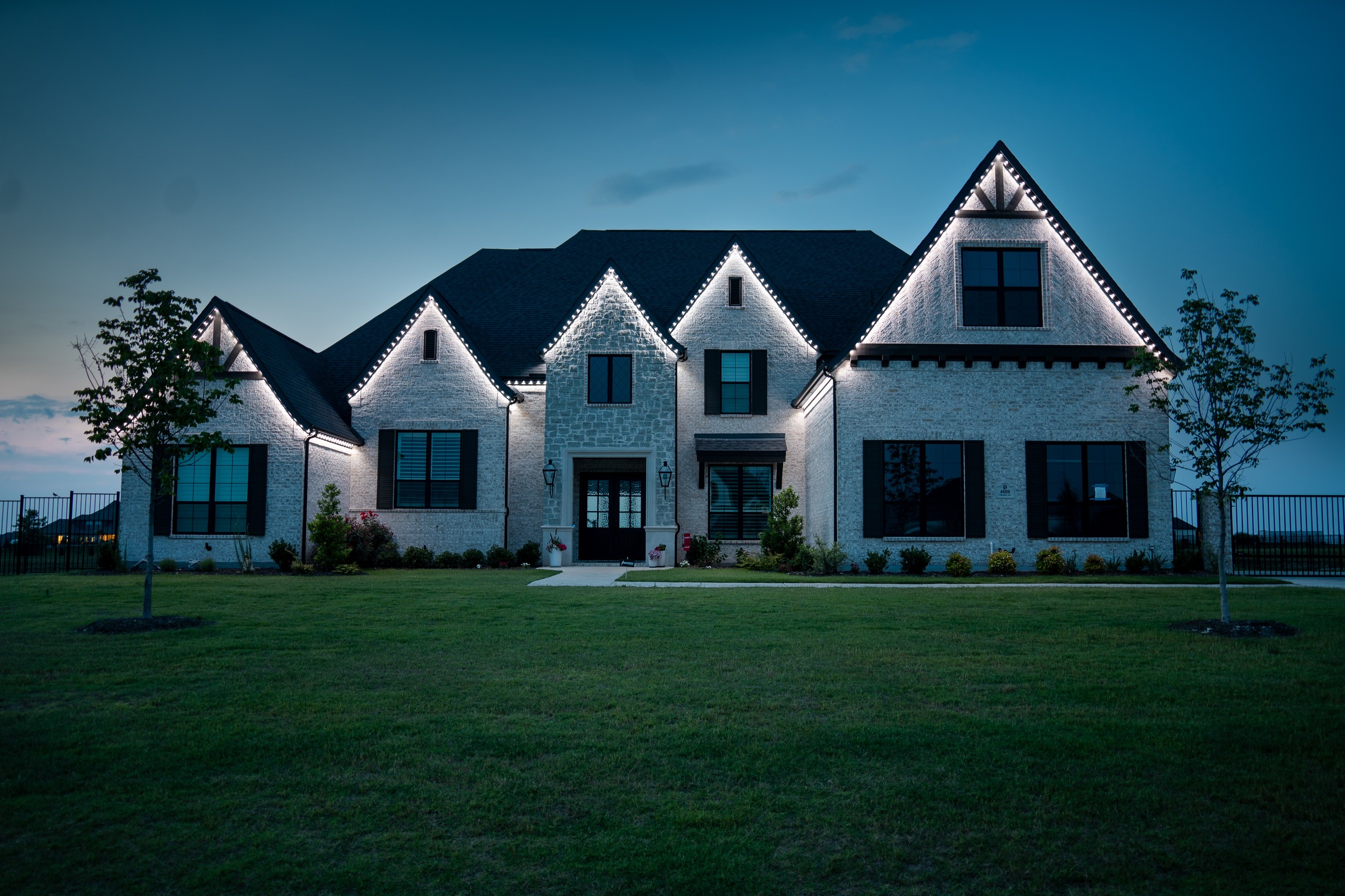 Home at night with Honest Outdoor Lighting
